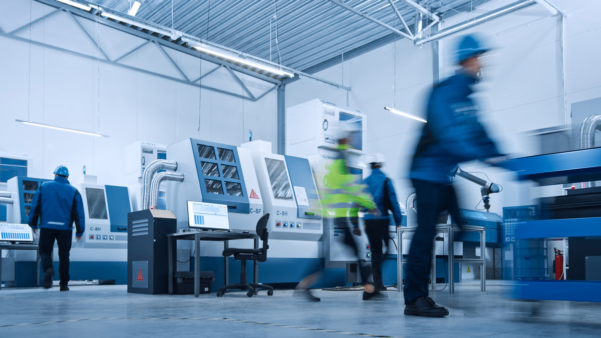 Professionals on a manufacturing floor